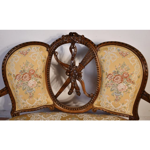 We are pleased to offer this beautiful Antique French Louis XV Loveseat, from the 1910s. This loveseat is made of carved...