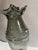 This is a smoke gray art glass vase made in Romania. There is fused glass surrounding piece. Vase is 14.5” tall. This...