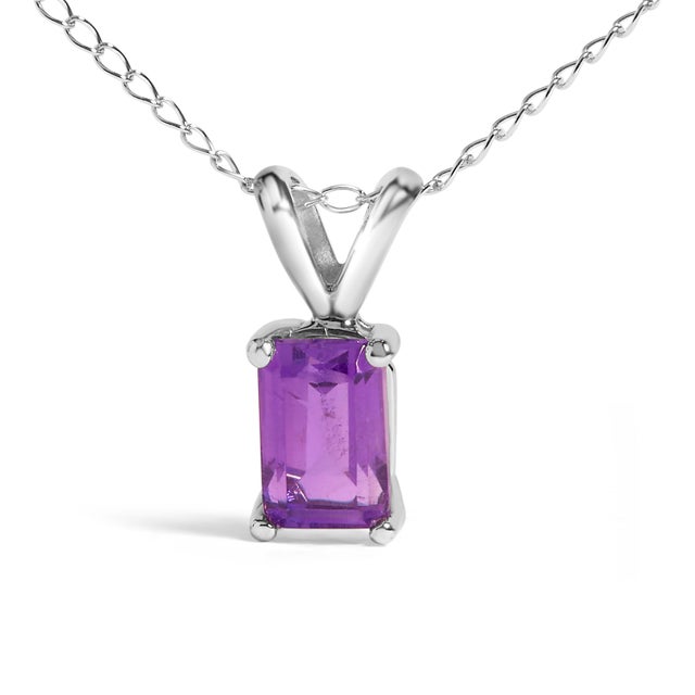 Draped in the regal splendor of a color-enhanced, natural amethyst, this 14K white gold pendant necklace exudes elegance...