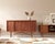 A magical danish cabinet with sliding doors and drawers in teak and walnut ✨ the cabinet has four sliding doors that slide...