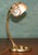 French Art Nouveau table lamp, circa 1900, attributed to Louis Majorelle, with a wonderfully sculptural brass frame and...