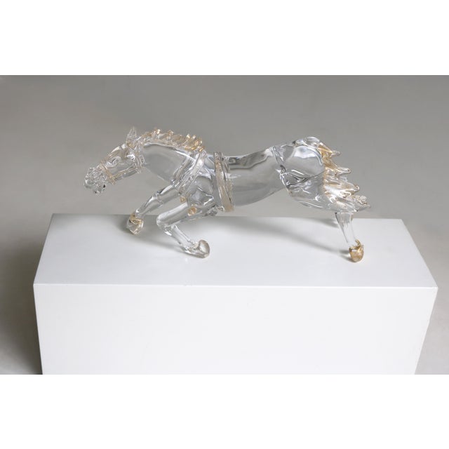 A dynamic Murano glass horse sculpture signed by Italian glass master Arnaldo Zanella. Hand-blown in Murano during the...