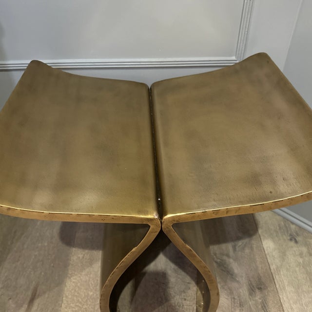 Contemporary symmetrical gold bench. Perfect as a small accent piece in any room…. Height 18" Width 20" Depth 16" Seat...