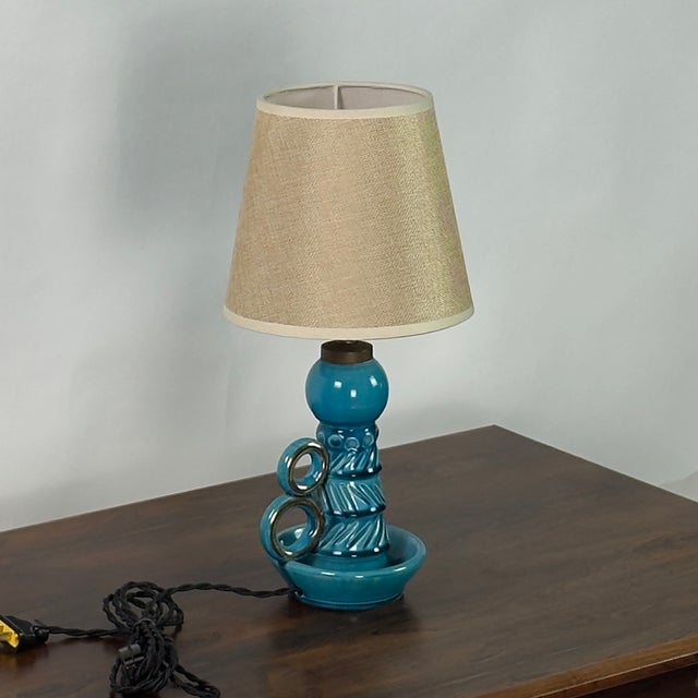 Small Turquoise Ceramic Candlestick Lamp by Accolay Pottery. Accolay pottery, a celebrated mid-century French studio...