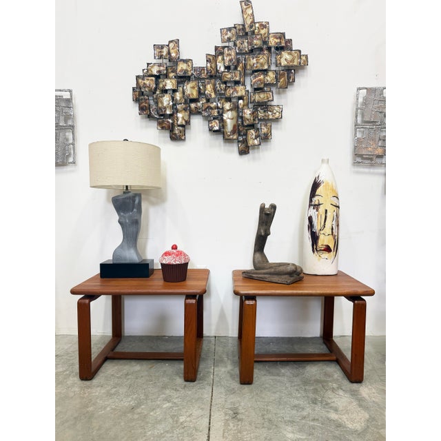 A bold vintage MCM Brutalist wall sculpture composed of torch-cut brass and copper geometric panels, crafted in the style...