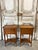 Pair of cherrywood bedside tables, circa 1970. The fronts open to reveal two drawers and a shelf forming a stretcher....