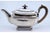 Silver Teapot with Handle and Knob in Chestnut Wood and Pearls, in Very Good conditions. Designed before 1890 This piece...