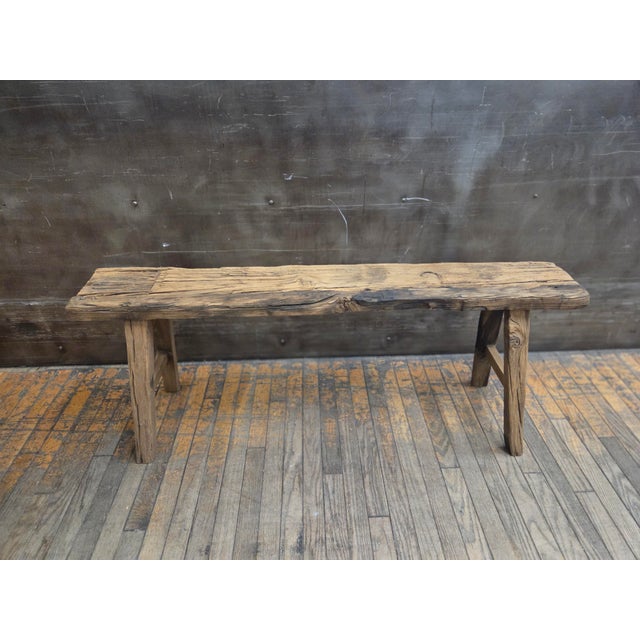 Dimensions: 48"W x 12"D x 20"H / 20"SH Ideal for an entryway or at the foot of a bed, this rustic bench is handcrafted...
