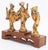 Three James Mont Style Gilt Metal Figural Sculptures, depicting dancing geisha figures, with tiered wood stand. Overall:...