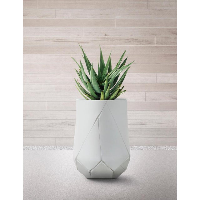 Bhaca XS Brown Planter by Indigenus Designed by Andile Dyalvane Dimensions: Ø 45,2 x H 56,5 cm. Materials: Stone. Weight:...