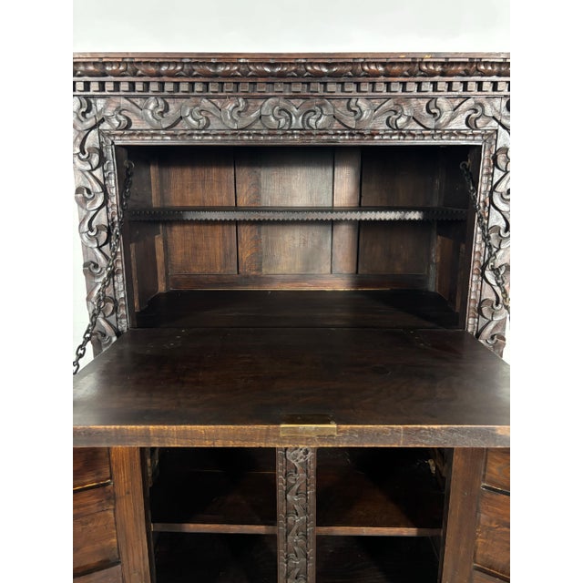 19th Century Baroque Oak Fall-Front Cabinet with Deep Carved Decoration For Sale - Image 6 of 18