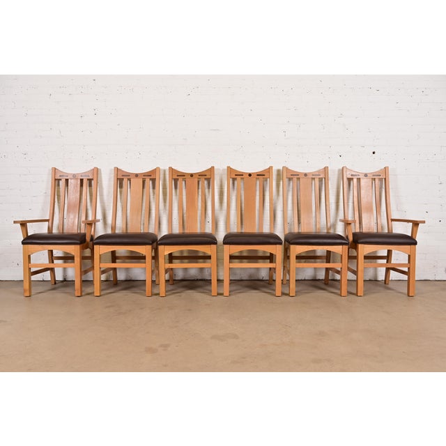 An exceptional set of six Mission or Arts & Crafts style high back dining chairs In the manner of Stickley or Charles...