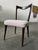 Chairs with varnished walnut frames and Boucle fabric upholstery, 1970s. Dimensions: seat height 43cm, width 46cm, total...