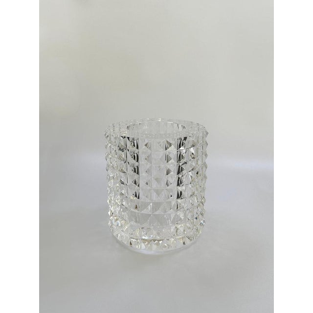 Contemporary faceted optical glass vase by Veritas, Texas, 2016, in crystal-clear cut glass with pyramid facets and a...