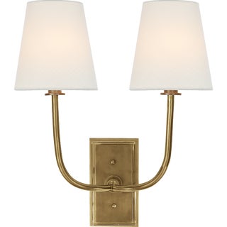 Thomas O'Brien for Visual Comfort Signature Hulton Double Sconce in Hand-Rubbed Antique Brass with Crystal Backplate with Linen Shades For Sale