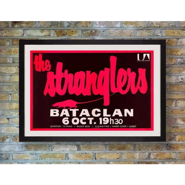 A rare original concert poster for a performance by british rock band the stranglers at the famous bataclan theatre in...