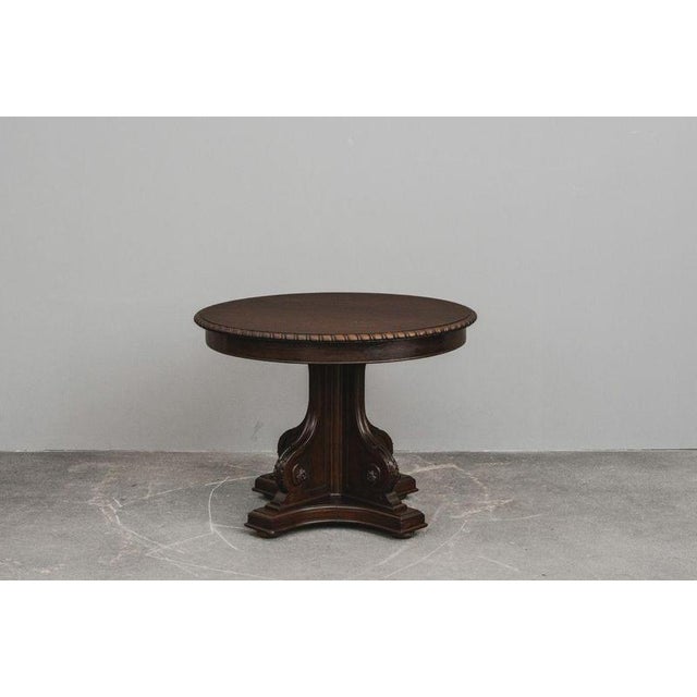 Object: Table Period & Style: Historicism - Late 19th Century Features: - Elegant and practical piece of furniture with a...