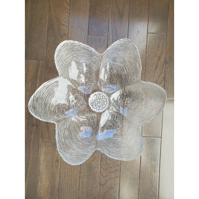 Although functional as as serving piece, this stunning large vintage glass oyster platter/bowl is beautifully detailed...