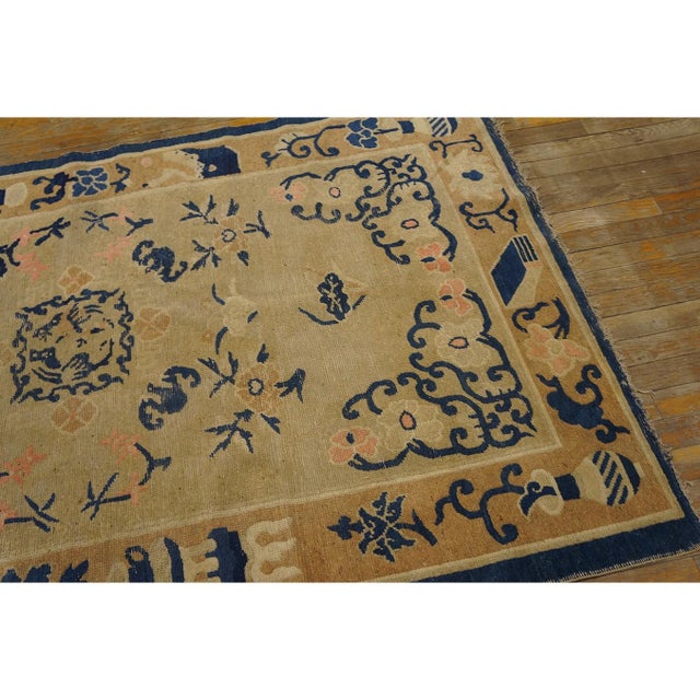 Antique Chinese - Peking Small Scatter Size Wool Ivory Rug, Circa Date: 1920s. This exquisite example of early 20th-...