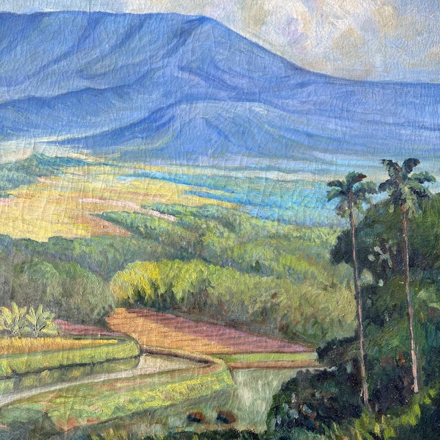 This atmospheric oil painting on canvas depicts rice fields on Bali with Mount Batur in the distance. Signed DEWAR in the...