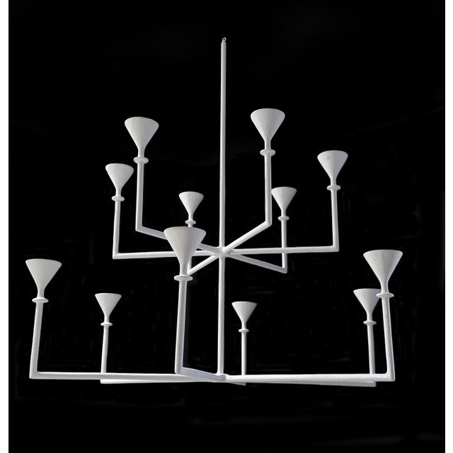 The silhouette of this Chandelier is both geometric and fluid, making it equally at home in contemporary or traditional...