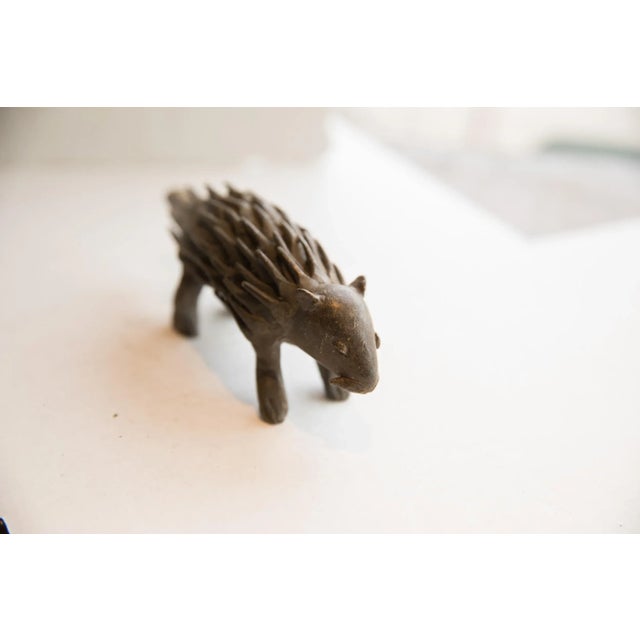:: Vintage handmade African porcupine sculpture. Circa late mid 20th century, though possibly older, this piece has such...