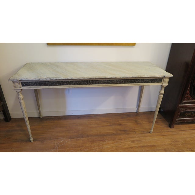 A 19th century Gustavian Console Table. Tall Gustavian Console Table with Faux painted Marble top having a marvelous...