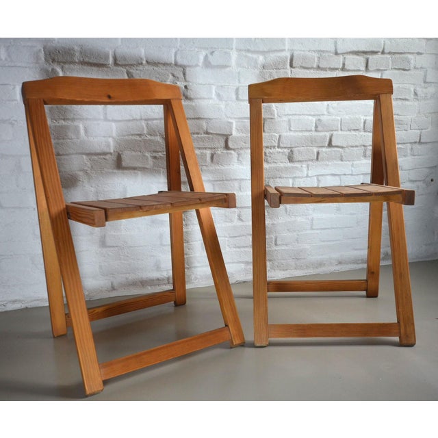 Aldo Jacober (Alberto Bazzani) folding chairs (Trieste) in pine very good condition. The chairs were finely sanded and...