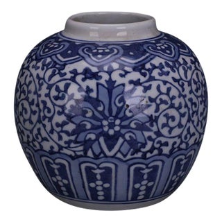 Vintage Chinese Blue and White Porcelain Jar With Scrolling Floral Motif For Sale
