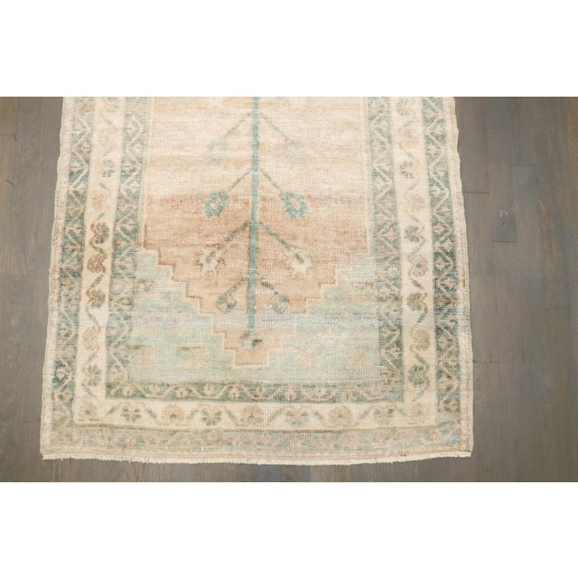 a mid 20th-Century Antique Washed Turkish Anatolian Rug