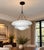 Matte White Layered Pendant Light | 4-Light Steel Shade Chandelier With Black Antique Brass Chain For Sale - Image 4 of 18