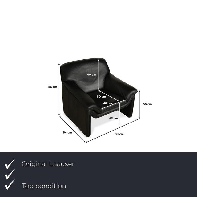 Laauser Armchair: Sculptural Elegance in Black. This armchair from the traditional brand Laauser is more than just a piece...
