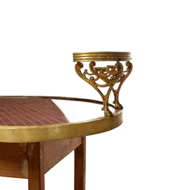 Dressing table. Legs used to be covered by a lace table skirt. It has unwelded fused brass borders, and a glass soap dish....