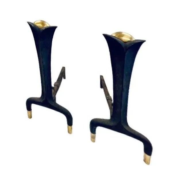 Superb pair of Donald Deskey Mid Century Modern and or Art Deco Brass and Cast Iron fireplace andirons Pieces are in...