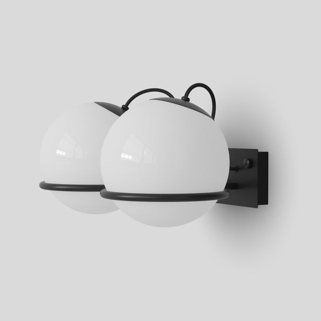 Model 237/2 design by gino sarfatti the two blown opaline glass spheres are gently held in place by two black, or...