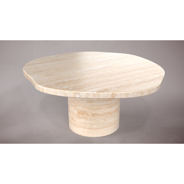 Introducing our versatile travertine coffee table, a seamless blend of natural beauty and modern design. Crafted with...