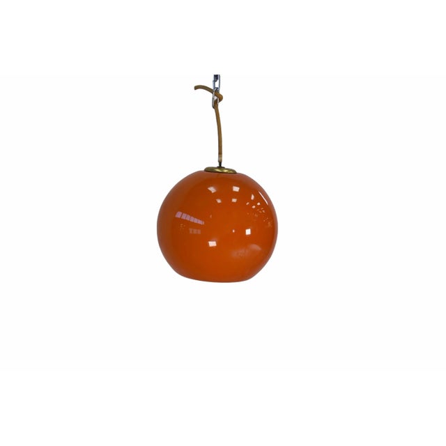 Vintage Ball Pendant Lights in Orange Opaline, 1970s, Set of 9, in Very Good conditions. Designed 1970 to 1979 European...