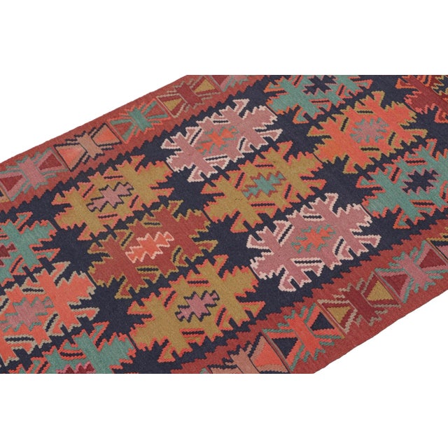 This vintage 4x10 Persian Kilim is a tribal rug from Meshkin—a small northwestern village known for its fabulous works....