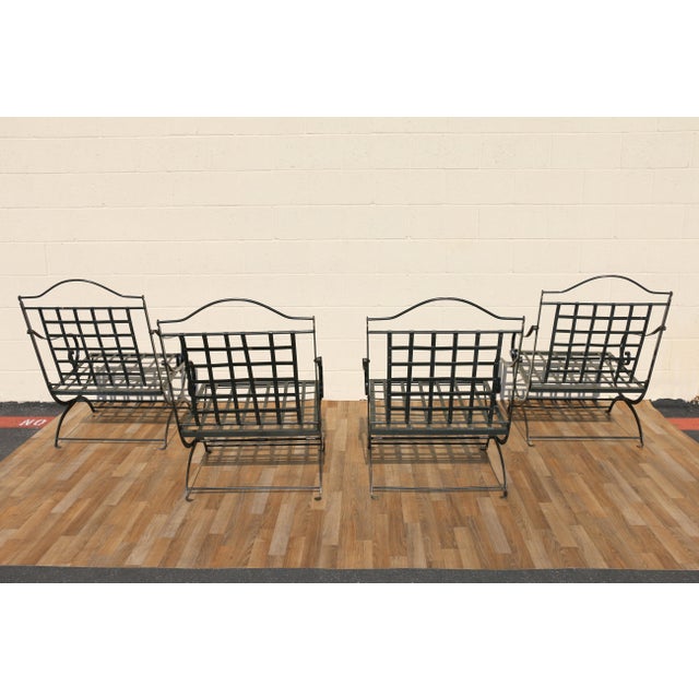 Exceptional vintage set of four wrought iron folding outdoor armchairs attributed to Hervé Baume, France, 1970s. These...