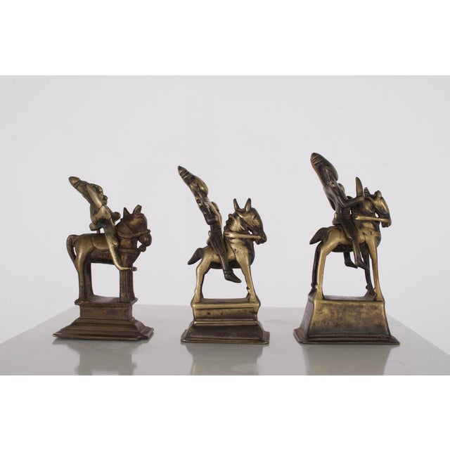 Three bronze (copper alloy) horsemen, West India, 18th century. Provenance: Formerly in the Claude de Marteau collection....