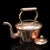 This is an antique scullery kettle. An English, copper stovetop teapot, dating to the Victorian period, circa 1870....