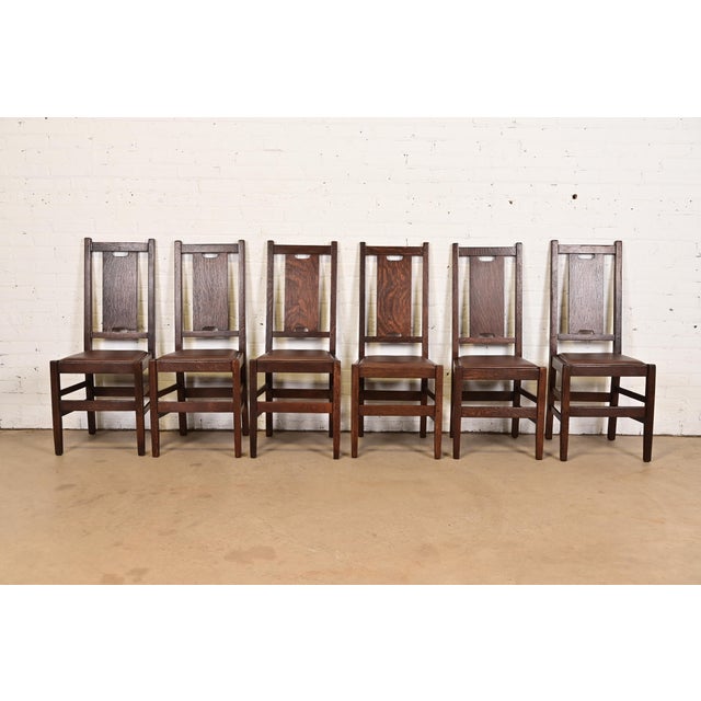 A rare set of six Mission or Arts & Crafts period H-back dining chairs By Gustav Stickley USA, Circa 1912 Solid quarter...