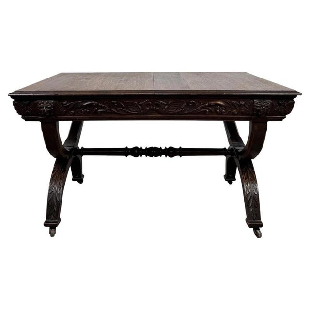 An impressive 19th century English Victorian centre table, finely crafted in oak and distinguished by its substantial...