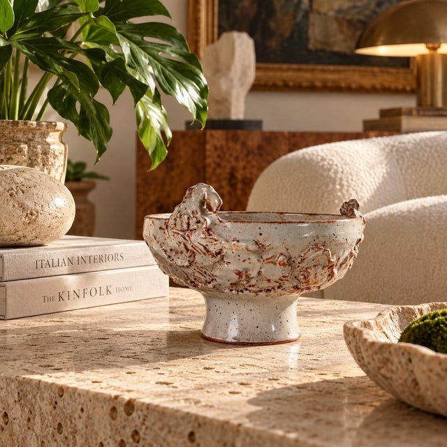Distinctive vintage handmade studio pottery pedestal bowl, circa 1997, featuring an organic sculptural form with raised...