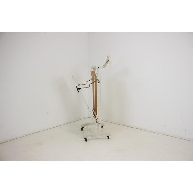 Chamber stand, elegant trouser press from the second half of the last century (circa 1970), which is in good condition and...