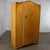 Handsome Early to Mid-20th Century Vintage English & Art Deco style large wardrobe, armoire, or storage cabinet composed...