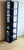 Incredible lacquered massacre ebony shelf with metal frame by Christian Liaigre. This is a tall shelf with Liaigre's...