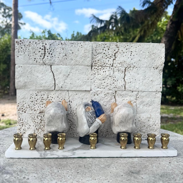 A meaningful and sculptural vintage Israeli Chanukiah, thoughtfully designed to evoke the sacred atmosphere of the Western...