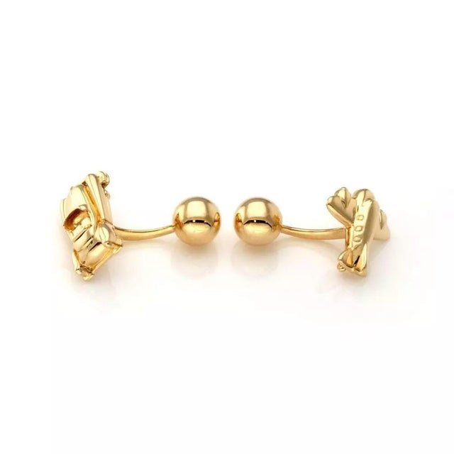 This is an amazing pair of cufflinks from Cartier, crafted from 18k yellow gold, the pair features detailed 3D work, a...