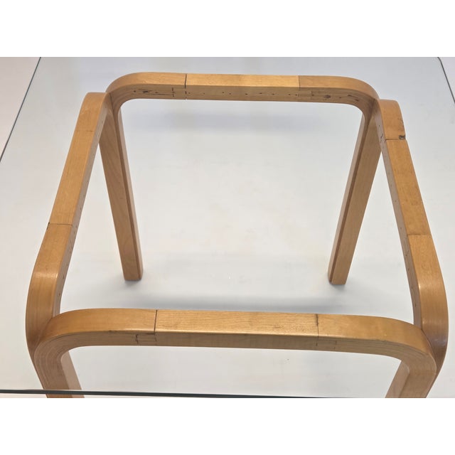 Artek Y805C glass table, designed by Alvar Aalto. The table is old, probably from the 1950s, and shows the old joints....